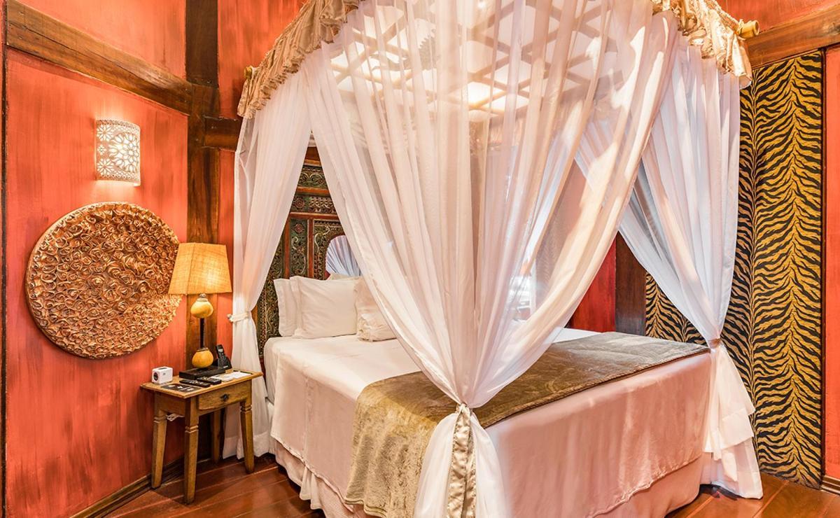 Dpny Beach Hotel & Spa Ilhabela Kültér fotó A mosquito net over a bed